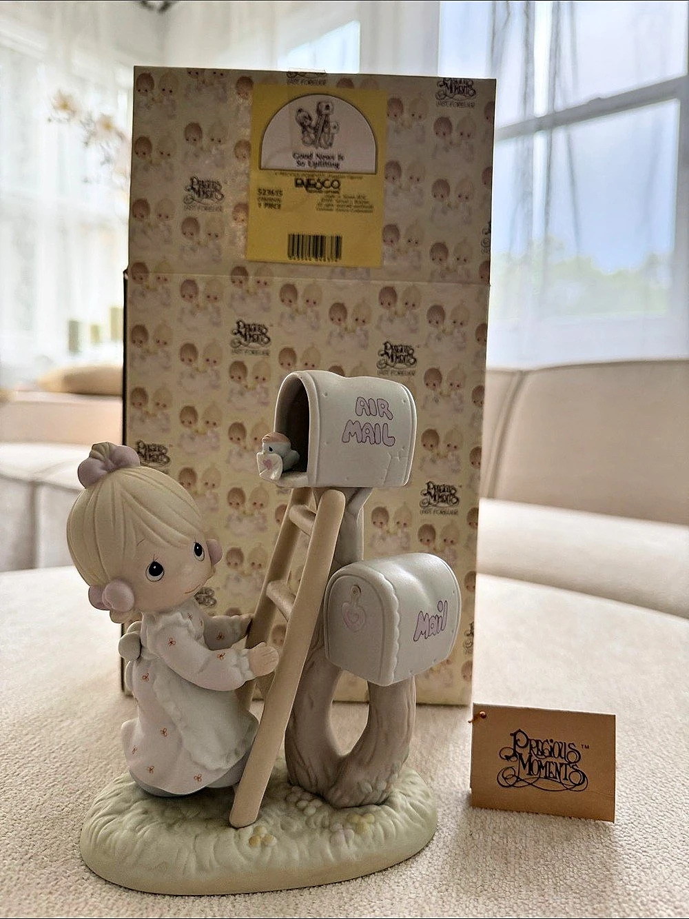 Enesco Precious Moments 
Good News Is So Uplifting Porcelain Figurine with Box